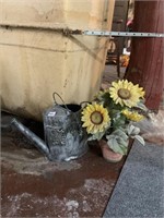 WATERING CAN AND SUNFLOWER