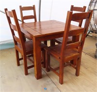 Solid and Heavy Wood Table and Four Chairs.