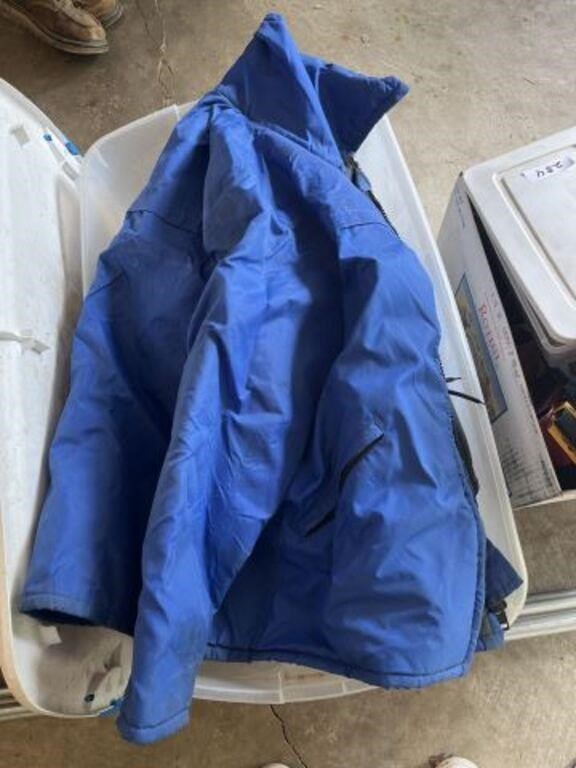 Large plastic bin, life jacket, duffel bags