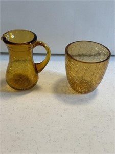 2- amber Crackle pitchers
