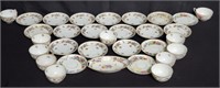 Set of porcelain tea cups and saucers