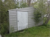 Tan color outdoor shed as is 16' by 8' by 8'