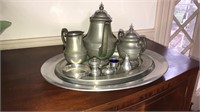 Group of pewter including a three-piece tea set,