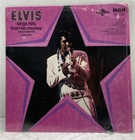 Elvis sings hits from his movies