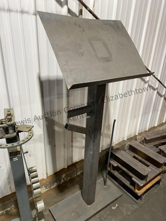 Heavy metal podium, approximately 59 inches tall
