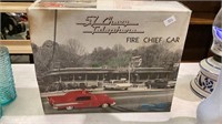 1957 Chevy telephone fire chief car in the