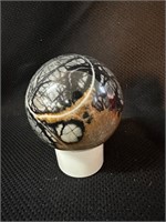 Sectarian Crystal Sphere