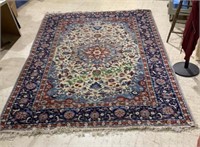 Large floral motif area rug with linen backing