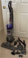 B - DYSON VACUUM CLEANER W/ ATTACHMENTS (N31)