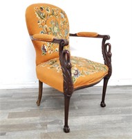 Antique carved Empire-style arm chair with swan