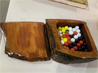 wooden box with colored marbles