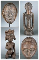 Four Congo style masks and figures. 20th century.
