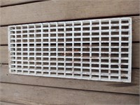 White chippy wooden grate