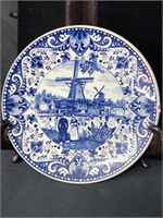 Blue plate with windmill background made in