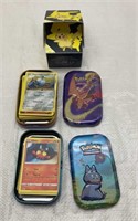 Pokémon tins and deck with cards