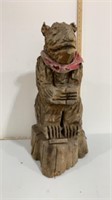 Weathered carved bear statue
