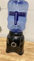 Primo water bottle and stand