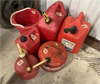 Collection of Gas Cans and Bucket