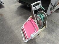 Hose reel and folding chair.