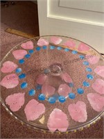 Cake stand and stack of dessert plates