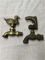 2 Brass wildlife taps.