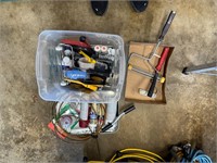 Assorted drywall tools and paint