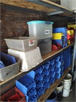Row of Plastic storage containers, top shelf