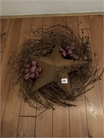 WREATH WITH METAL STAR DECORATION