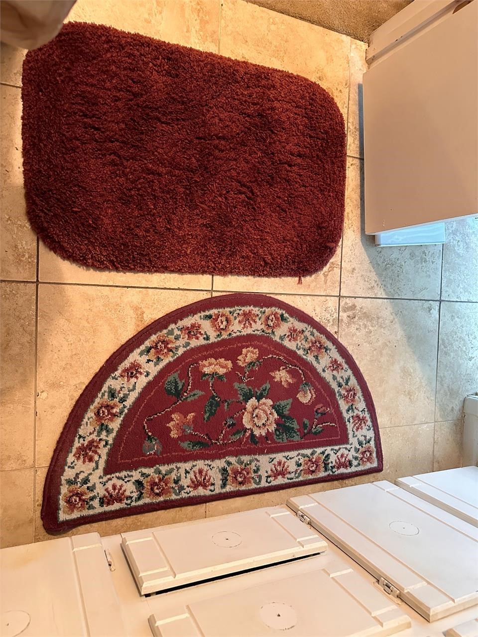 2 small bathroom rugs