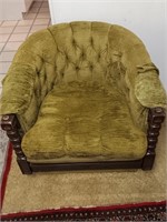 Green mid century armchair with wood trim