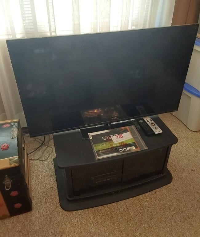 Visio 48" TV, stand, VCR and misc