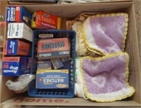 box of kitchen wrap, hand towels and miscellaneous