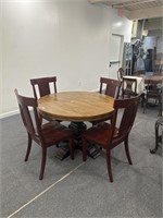 Oak Round dining room table and four chairs