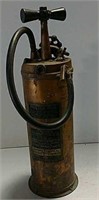 Heavy brass fire extinguisher with hand pump