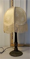 Table lamp with fringe shade