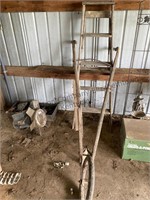 - old plow and a 4’  wood ladder