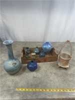 Pottery vases, most are blue colored