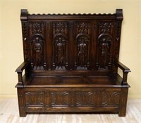 Neo Gothic Figural Carved Oak Lift Top Bench.
