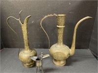 TWO VINTAGE ETCHED BRASS WATER PITCHERS AND