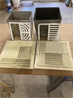 Two metal containers, two floor grates, two vent
