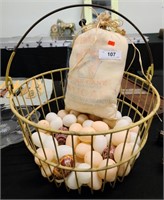 Antique basket, eggs, and sugar bag