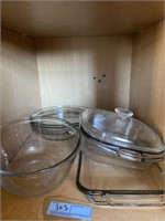 Contents in cabinet, casserole dishes and glass