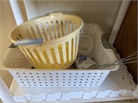 Shelf with baskets, fly swatter, cat shed