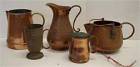Five copper jugs and mugs