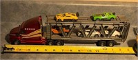 1/64 scale hauler with cars.