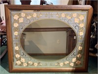 Mirror with floral decoration, measuring 31" x 25"