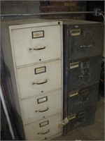 (2) 4 Drawer Filing Cabinets  18x29x52 Inches