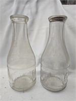 Pair of vintage glass foremost bottles