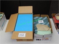 Two Boxes of Blue and Green Paper