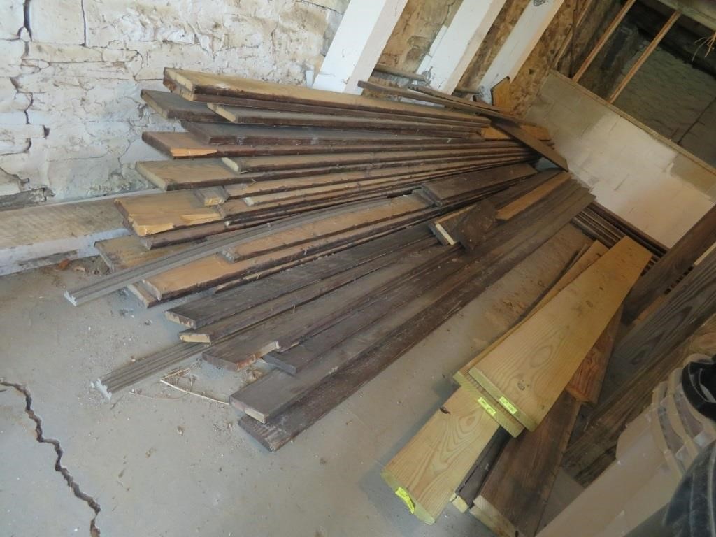 pile of old deck boards, 3 new treated boards